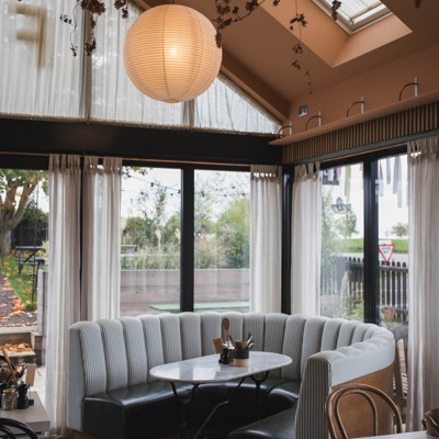 Fluted Booth Seating Within a Café