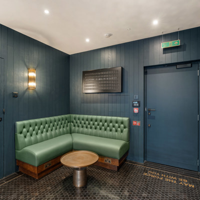 Deep Button Back Banquette in Green Leather